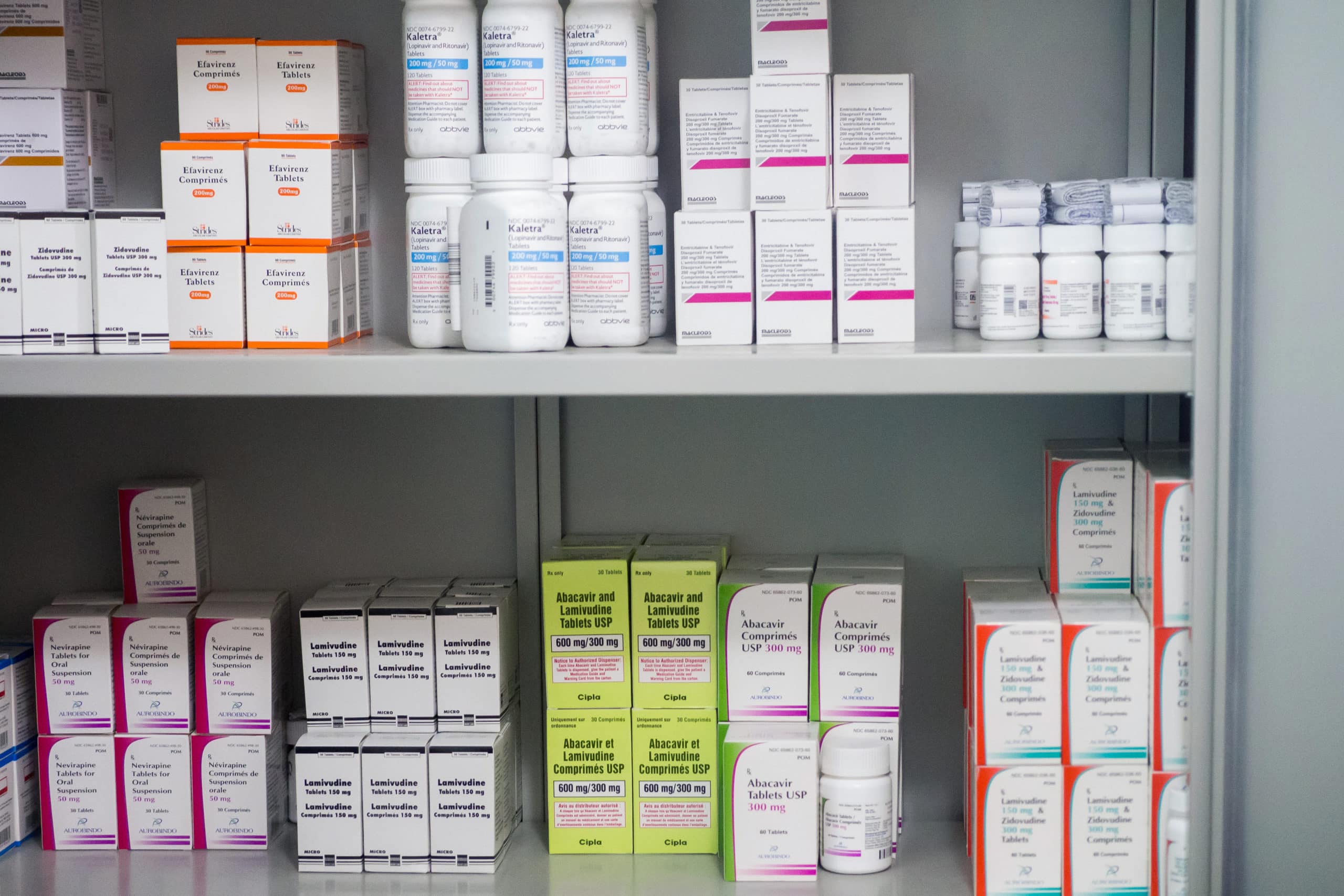 Prescription drugs for treating HIV on a store shelf